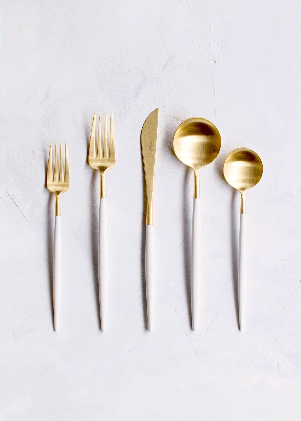 Cutipol Goa White Matte Brushed Gold-Plated Cutlery Collection